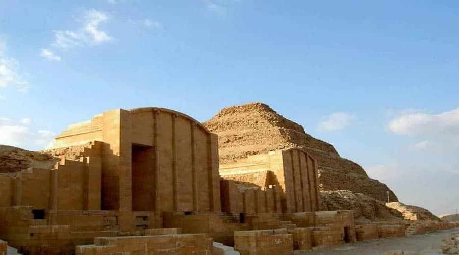 Ruins and statues at the ancient city of Memphis, Egypt, including the colossal statue of Ramses II